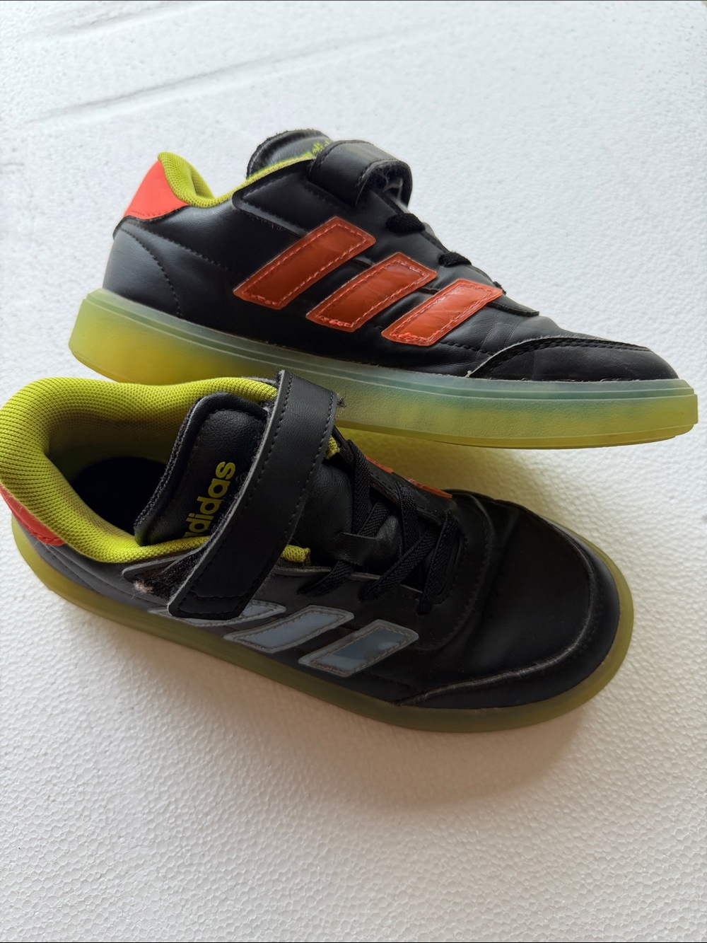 adidas Kids Black Sneakers with Orange Stripes and Neon Green Lining
